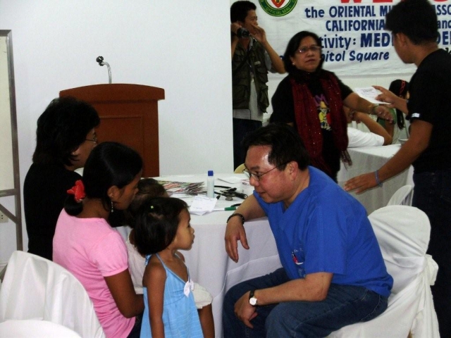 Dr. Tony Reyes attending to patient